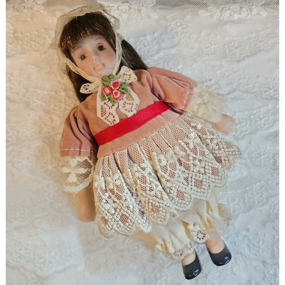 Bisque Doll Dressed In A Dusty Pink Lacy Dress, Bonnet and Bloomers 6.5"